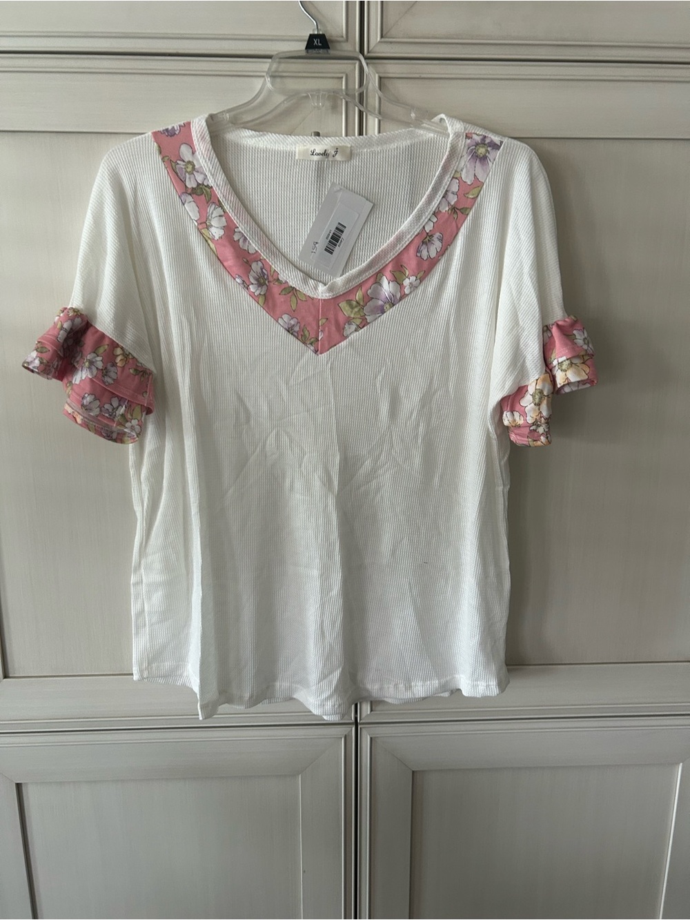 White V-Neck Short Sleeve Tee with Pink Floral Trim
